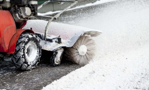 Snow Blower. Snow blowing machine in the street.